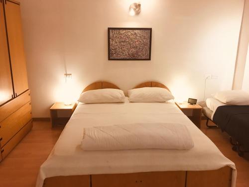 Postel nebo postele na pokoji v ubytování Appartamento Galliera