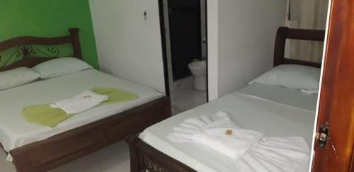 Ένα ή περισσότερα κρεβάτια σε δωμάτιο στο Hotel Mansión del Cesar