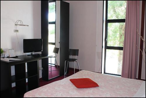 Cama o camas de una habitación en Hotel Giannina