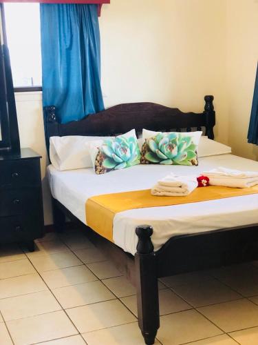 Letto o letti in una camera di Tonga Holiday Villa