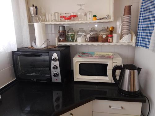 Dapur atau dapur kecil di Akhva Accommodation Unit-אחווה יחידת אירוח