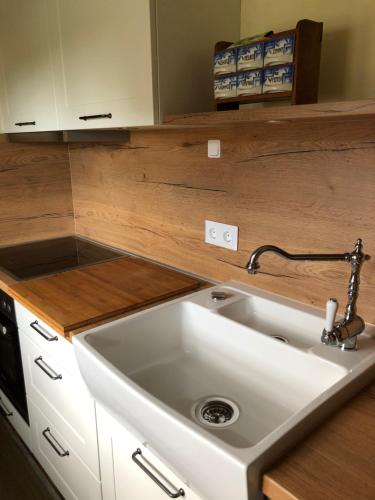 a kitchen with a sink and a counter top at Ferienhaus Leitner in Kitzeck im Sausal