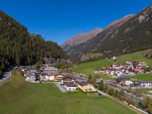 an aerial view of a village in the mountains at Appartement MonAlisa in Sölden