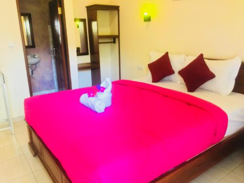 Katil atau katil-katil dalam bilik di Yudhist Guest House