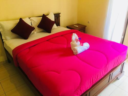 Katil atau katil-katil dalam bilik di Yudhist Guest House