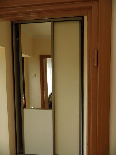 a mirror on a wall in a room at OW Mikomania in Charzykowy