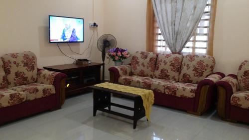 พื้นที่นั่งเล่นของ IsMa Lumut Homestay