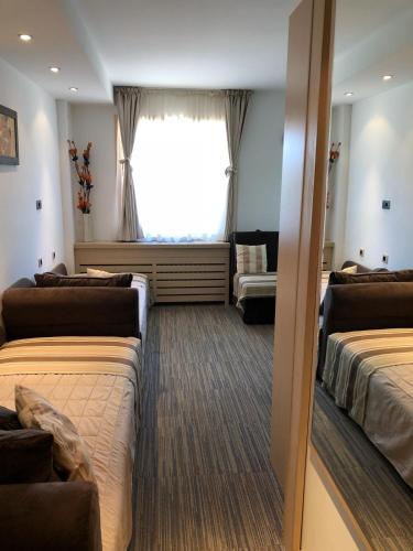 Ένα ή περισσότερα κρεβάτια σε δωμάτιο στο Apartman Viktor