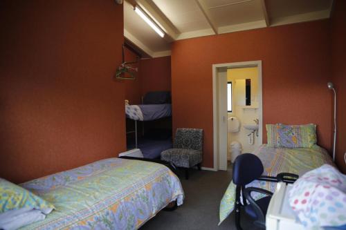 Кровать или кровати в номере Central City Camping Park