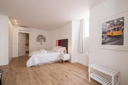 Postel nebo postele na pokoji v ubytování Santo António House - Exclusive Apartment