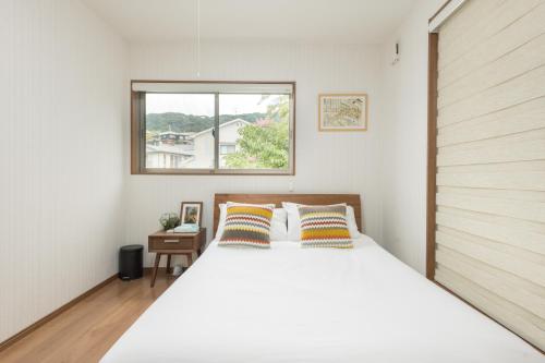 Posteľ alebo postele v izbe v ubytovaní Yuenshe Kiyomizu Villa