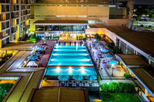an overhead view of a pool in a building at Becamex Hotel New City in Thu Dau Mot