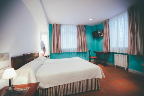 Katil atau katil-katil dalam bilik di Hotel Kaype - Quintamar