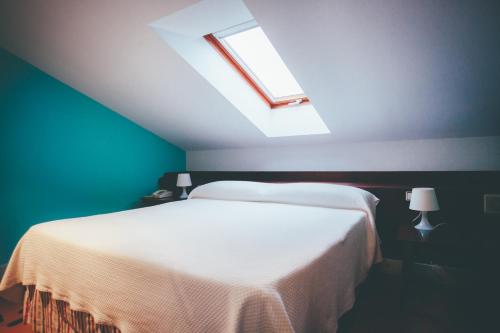 Katil atau katil-katil dalam bilik di Hotel Kaype - Quintamar