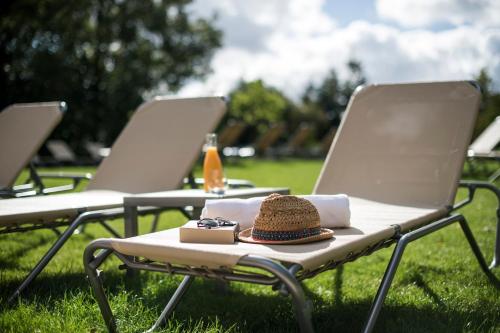 a sandwich sitting on top of a picnic table at Hostellerie Des Châteaux & Spa in Ottrott
