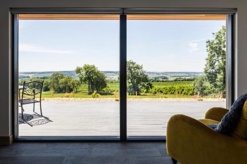 a room with a sliding glass door looking out onto a patio at The Hideaway Experience in Dundee