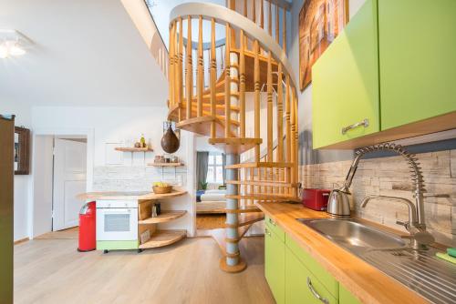 Кухня или мини-кухня в Design Apartments - "Potsdam City", 18
