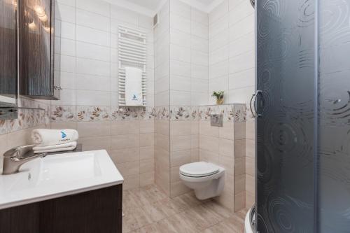 Ванная комната в Apartments Świnoujście Center by Renters