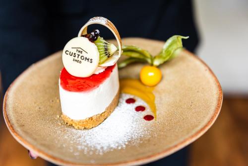 a dessert sitting on top of a plate at Novotel Cardiff Centre in Cardiff