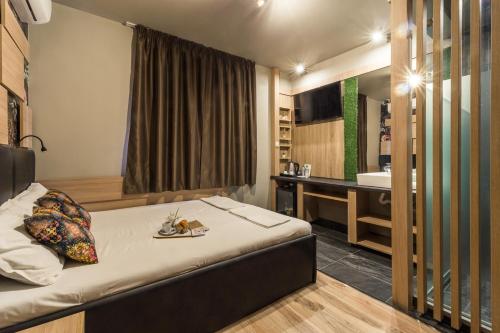 Postel nebo postele na pokoji v ubytování Hotel Allur