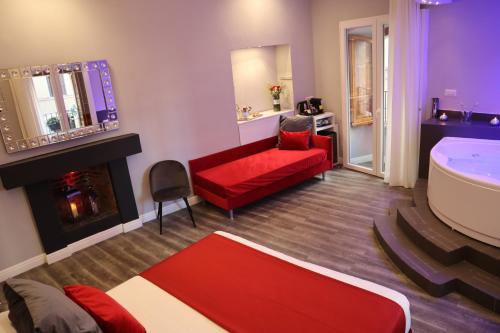 A bed or beds in a room at MILLINA SUITES IN NAVONA