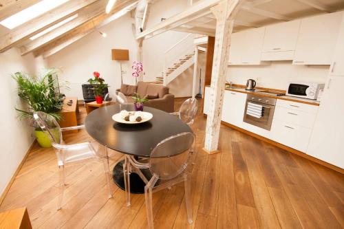 Kuchyň nebo kuchyňský kout v ubytování Kozna Loft