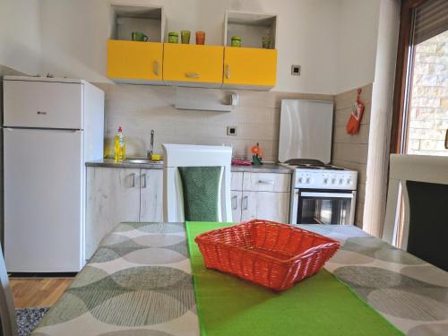 Kuchyň nebo kuchyňský kout v ubytování Stella Apartments