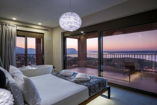 Ένα ή περισσότερα κρεβάτια σε δωμάτιο στο Villa KayLu