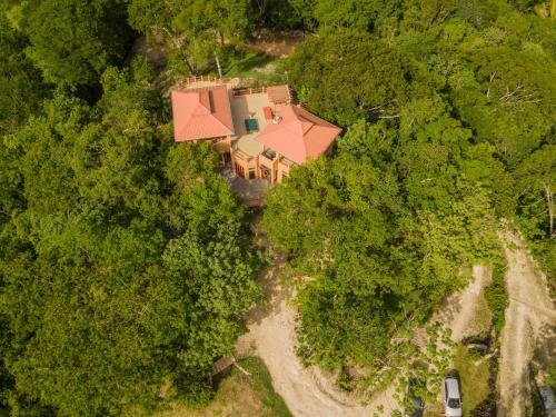 an overhead view of a house in the woods at Villa Cayo in San Ignacio