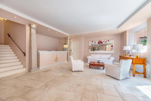 Posezení v ubytování Hotel Cala Lunga