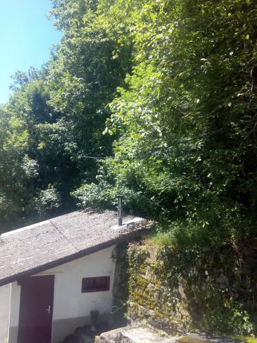 a white house with trees on top of it at Casa Manuelena in Valcarlos