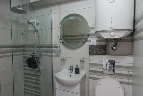 Un baño de " Tiamat " apartmani