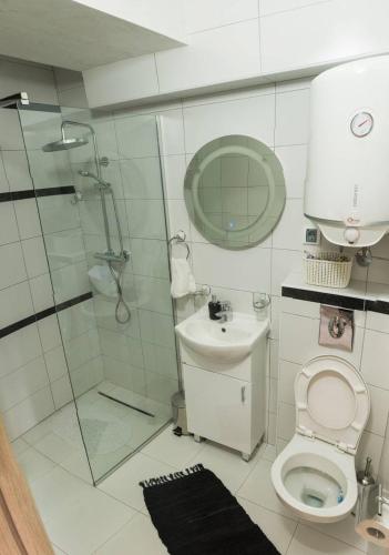 Un baño de " Tiamat " apartmani