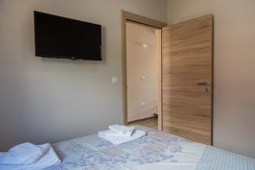 Una cama o camas en una habitación de " Tiamat " apartmani