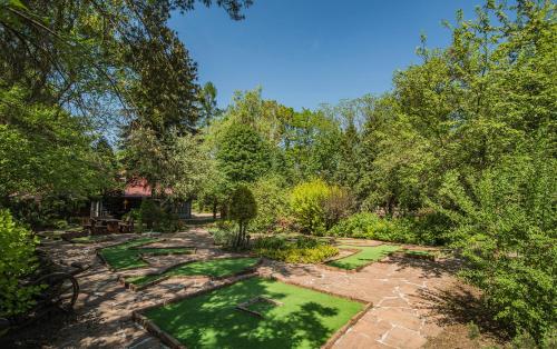 an aerial view of a garden with grass and trees at SKRZAT in Tumlin