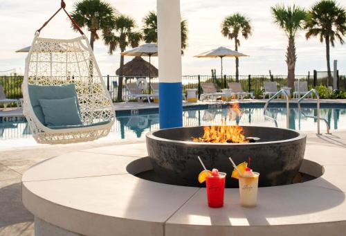 a fire pit in the middle of a pool at Sirata Beach Resort St Pete Beach in St Pete Beach