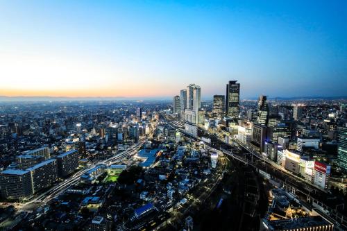 an aerial view of a city at night at Nagoya Prince Hotel Sky Tower in Nagoya