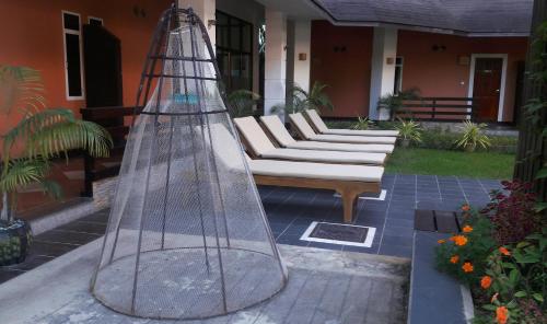 Un jardín fuera de Immana Grand Inle Hotel