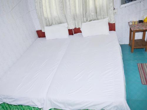 A bed or beds in a room at A.D.1Hotel
