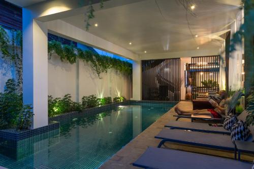 Πισίνα στο ή κοντά στο Monthara Angkor Residence