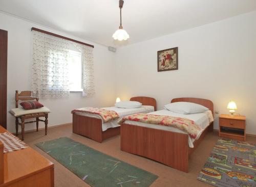 Postel nebo postele na pokoji v ubytování Apartment 1686