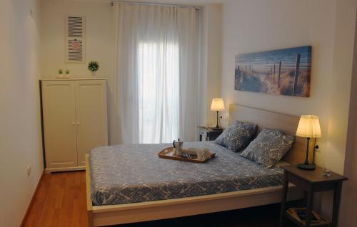 Cama o camas de una habitación en Sitges Ático 2 min a Playa San Sebastían