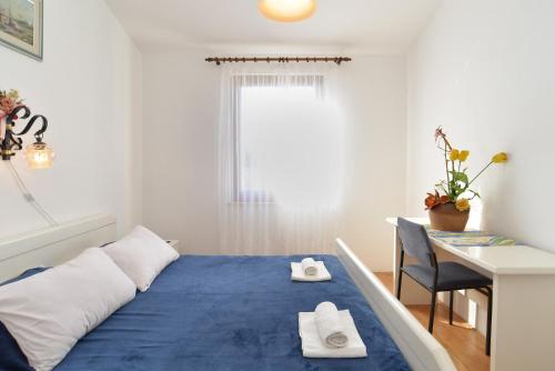 Postel nebo postele na pokoji v ubytování House Premantura 1096