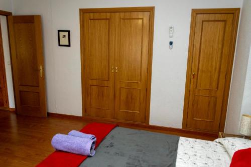 Łóżko lub łóżka w pokoju w obiekcie Apartamento Pleno Centro PARKING GRATIS