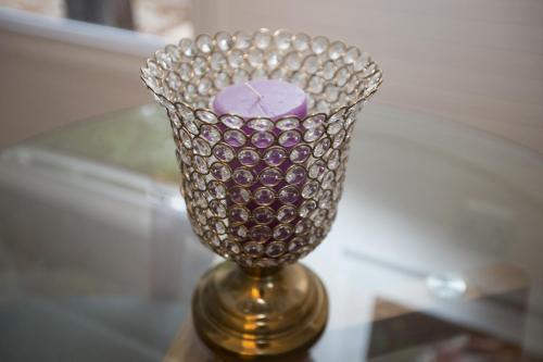 a glass vase sitting on top of a table at Valmont Estate in Plettenberg Bay