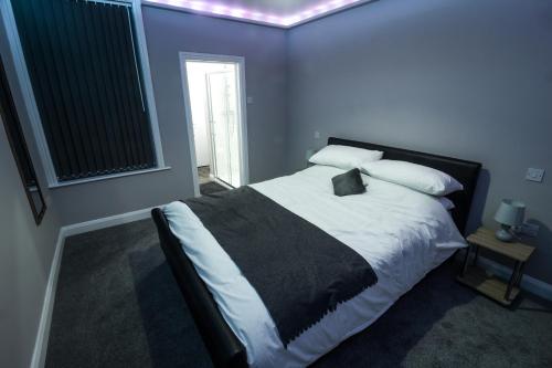 Ένα ή περισσότερα κρεβάτια σε δωμάτιο στο 159 Smart Apartments
