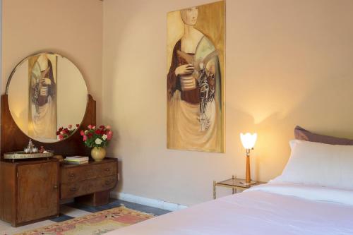 Giường trong phòng chung tại Riad Adrar