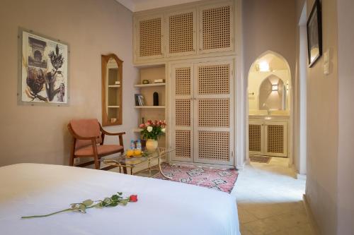 Giường trong phòng chung tại Riad Adrar