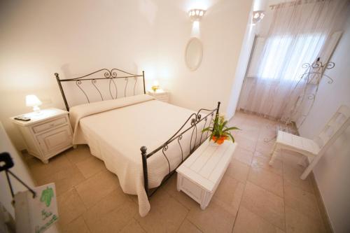 En eller flere senger på et rom på Antica Masseria Ficazzana - Tenuta
