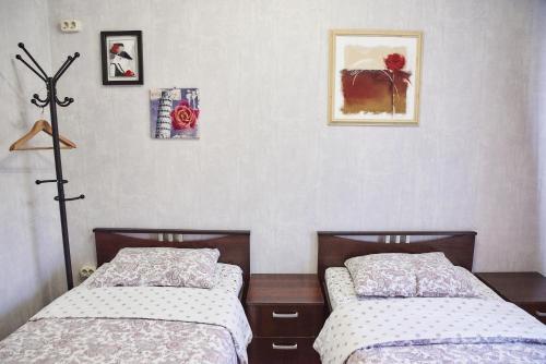Кровать или кровати в номере Хостел ХотХос